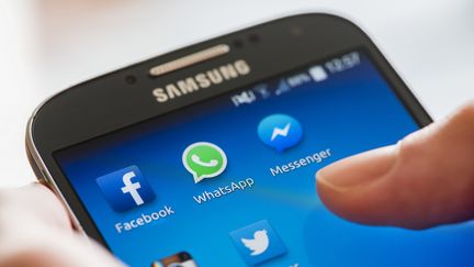 Facebook, WhatsApp and Messenger on smartphone (EThamPhoto / The Image Bank Unreleased)