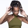 La chanteuse Camille Yembe en session photo à Paris, le 2 juillet 2025. (JOEL SAGET / AFP)